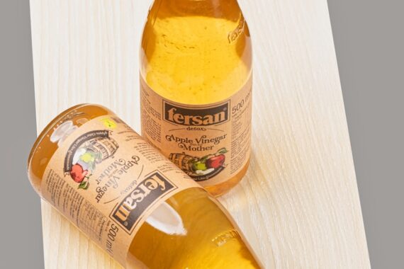 yellow and white labeled bottle