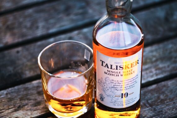 Talisker bottle beside drinking glass